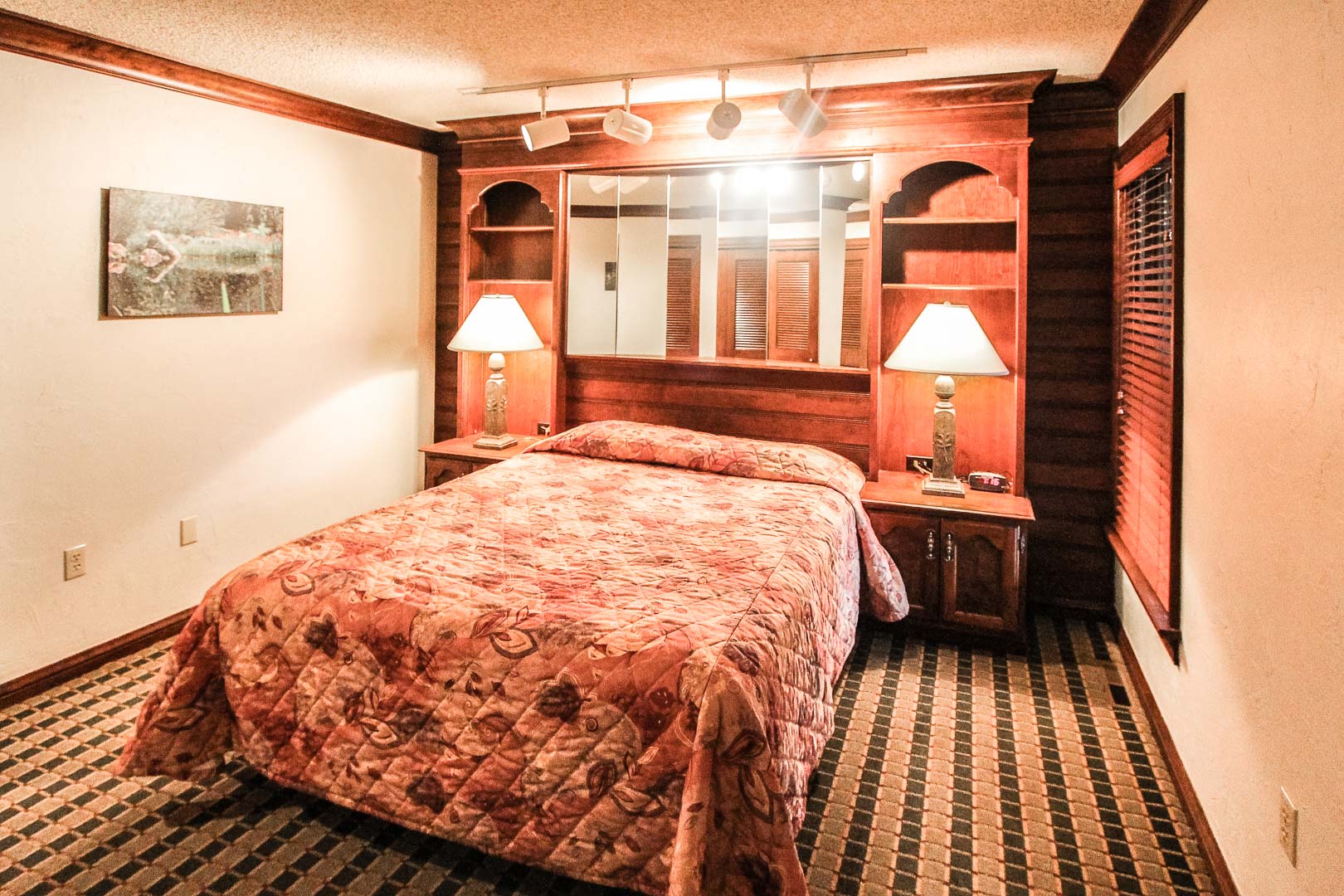 A cozy bedroom at VRI's Sunburst Resort in Steamboat Springs, Colorado.